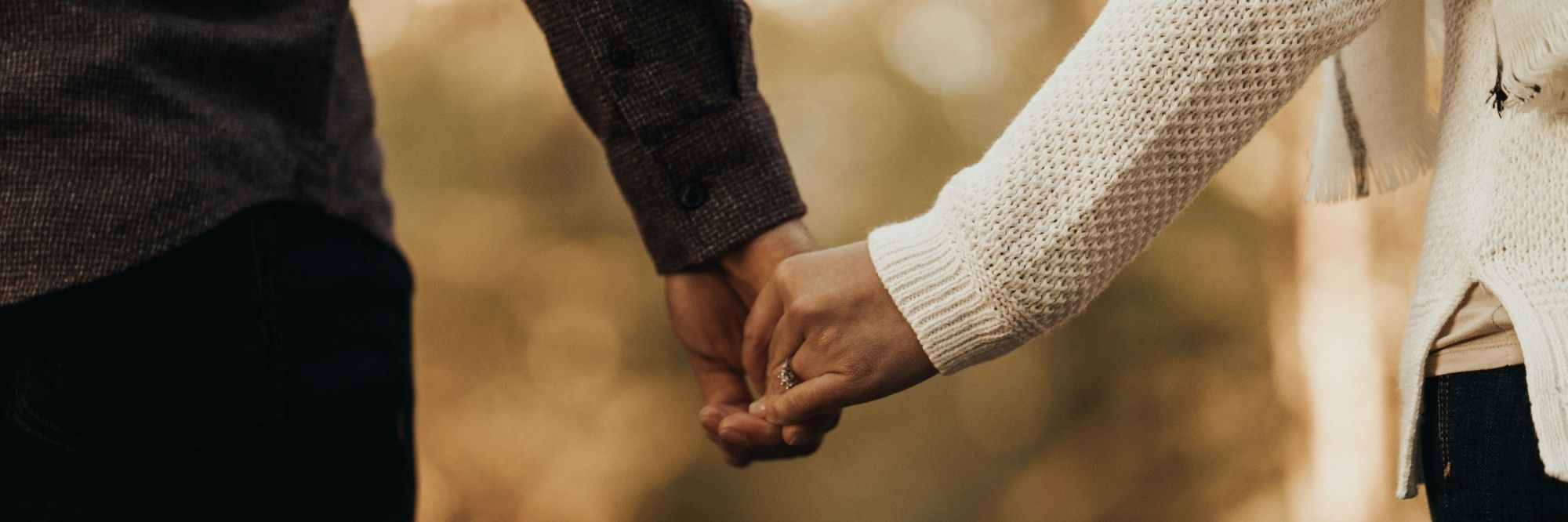 two people holding hands in a very generous fashion