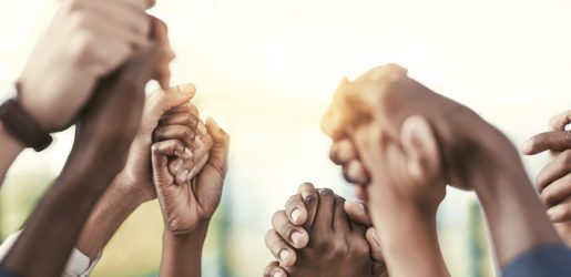 Good teams become great ones when they support each other Cropped shot of a group of businesspeople holding their hands in solidarity